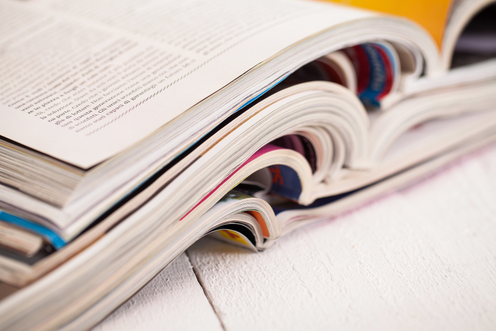pile-colorful-magazines-table